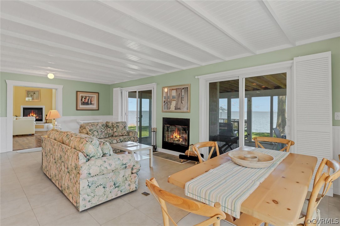 324 Fleet Road Heathsville, VA 22473 - Photo 19 of 49 a living room with furniture large window and a fireplace