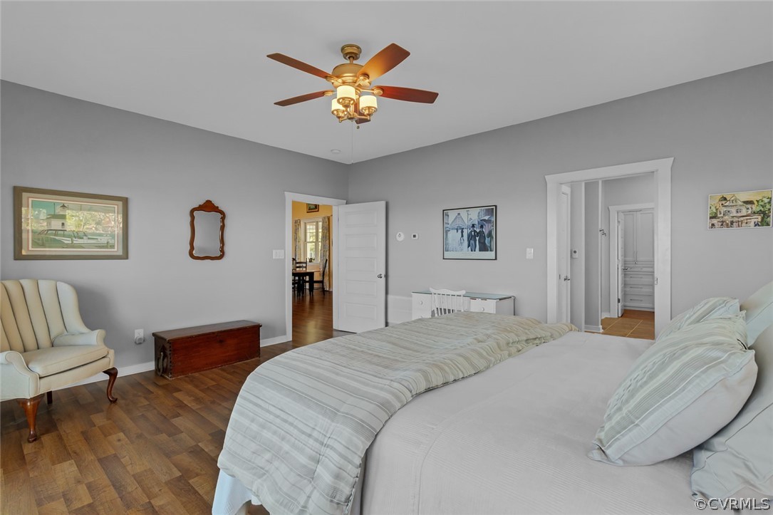 324 Fleet Road Heathsville, VA 22473 - Photo 23 of 49 a bedroom with a bed and a chandelier