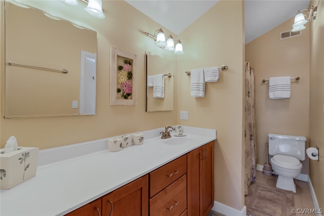 324 Fleet Road Heathsville, VA 22473 - Photo 31 of 49 a bathroom with a sink a toilet and a mirror