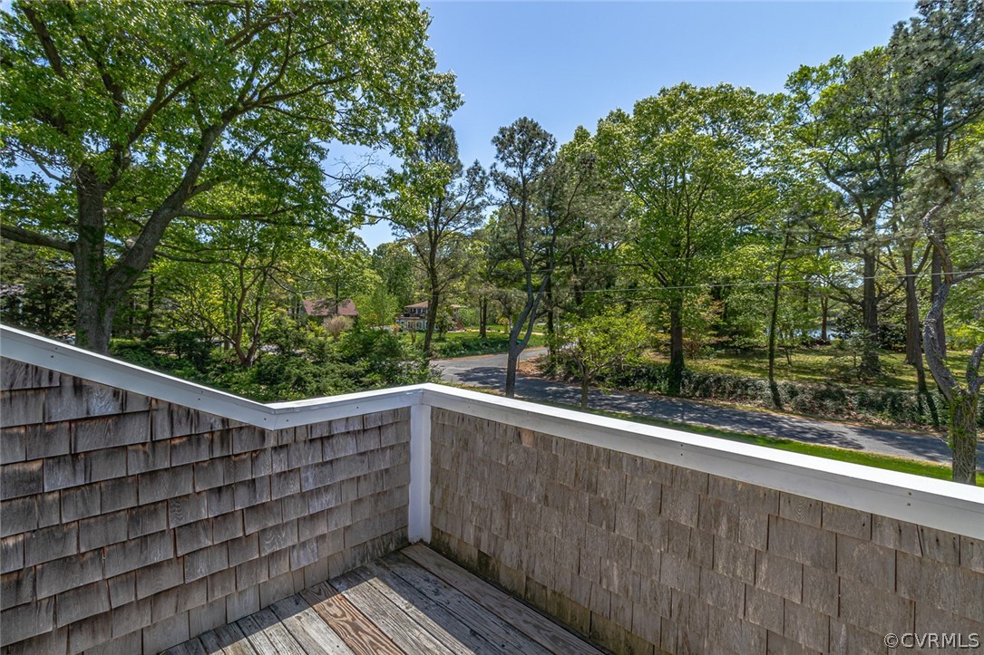 324 Fleet Road Heathsville, VA 22473 - Photo 33 of 49 a view of wooden balcony and trees