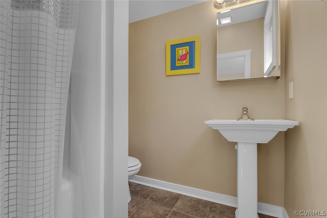 324 Fleet Road Heathsville, VA 22473 - Photo 36 of 49 a bathroom with a sink and a mirror