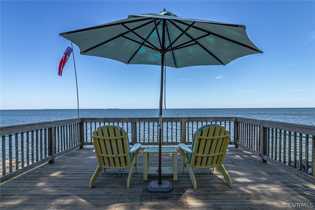 324 Fleet Road Heathsville, VA 22473 - Photo 41 of 49 a view of deck with furniture and umbrella