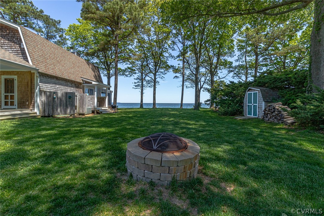 324 Fleet Road Heathsville, VA 22473 - Photo 42 of 49 a view of a backyard with plants and tree