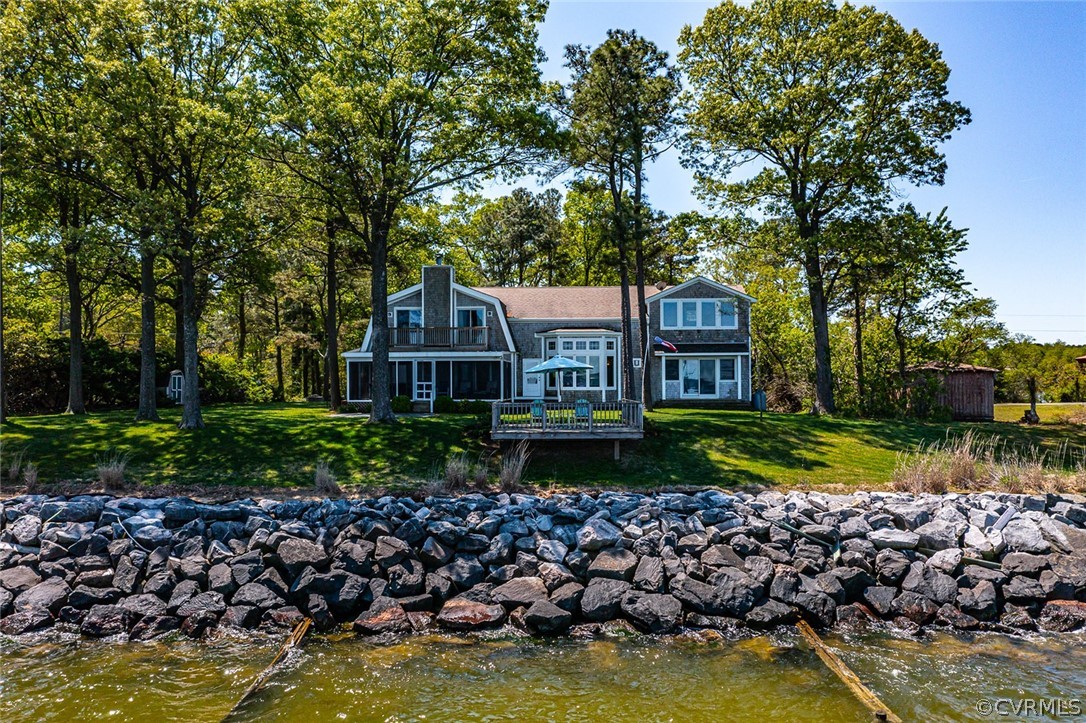 324 Fleet Road Heathsville, VA 22473 - Photo 46 of 49 a house with a large pool in front of it