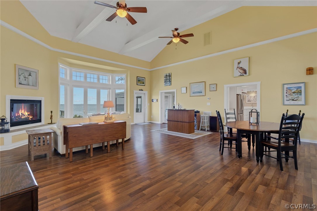 324 Fleet Road Heathsville, VA 22473 - Photo 9 of 49 a living room with furniture dining table wooden floor and a fireplace