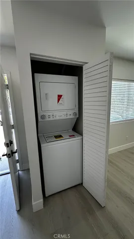 a kitchen with stainless steel appliances a refrigerator stove and microwave