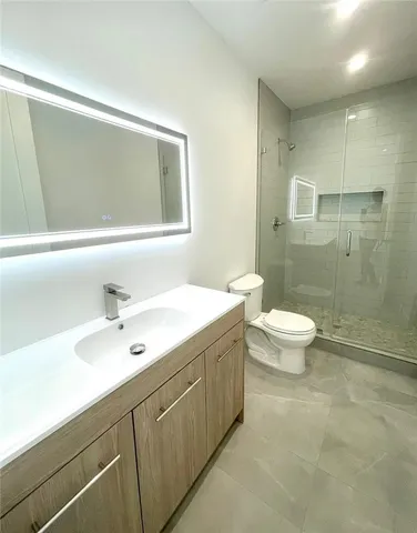 a view of backyard of a house