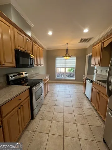 a bathroom with a double vanity sink toilet and mirror