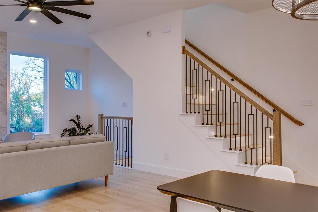 2130 Shea Road, Unit 1002 Dallas, TX 75235 - Photo 20 of 39 Living room featuring light hardwood / wood-style flooring and ceiling fan