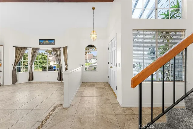 a view of a hallway with windows