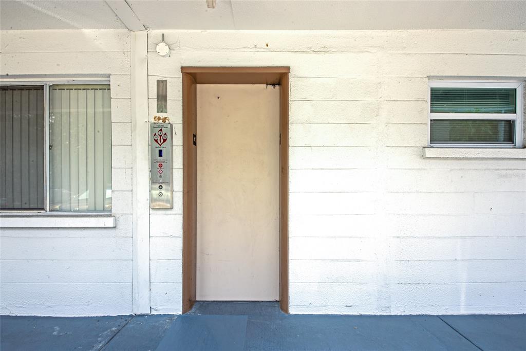 5912 Palm Lane, Unit C36 Bradenton, FL 34207 - Photo 24 of 34 a view of front door of a house