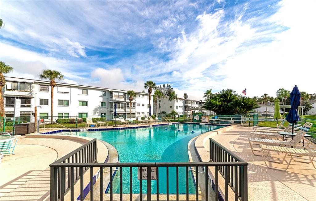5912 Palm Lane, Unit C36 Bradenton, FL 34207 - Photo 26 of 34 a view of swimming pool from a balcony