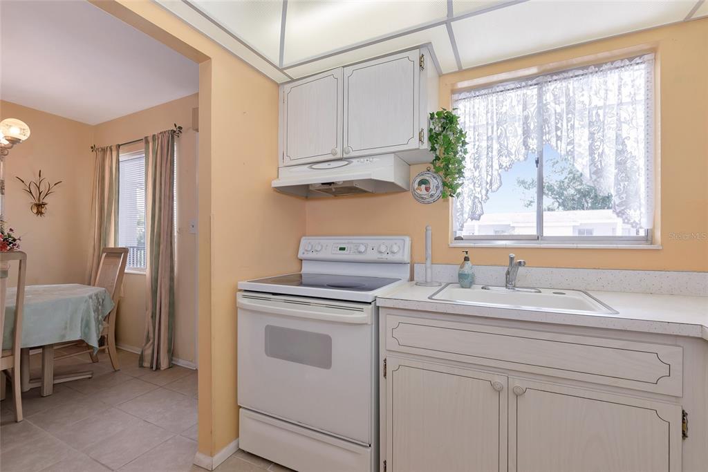 5912 Palm Lane, Unit C36 Bradenton, FL 34207 - Photo 10 of 34 a bathroom with a sink and a window