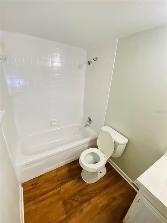 2757 L B McLeod Road, Unit C Orlando, FL 32805 - Photo 11 of 23 a bathroom with a toilet and a shower
