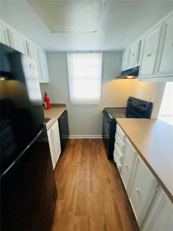 2757 L B McLeod Road, Unit C Orlando, FL 32805 - Photo 9 of 23 a utility room with dryer and washer