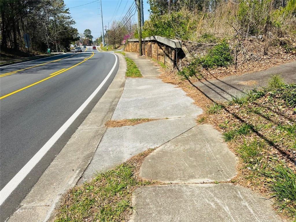 2520 Baker Road Acworth, GA 30101 - Photo 7 of 16 a view of a swimming pool with a yard