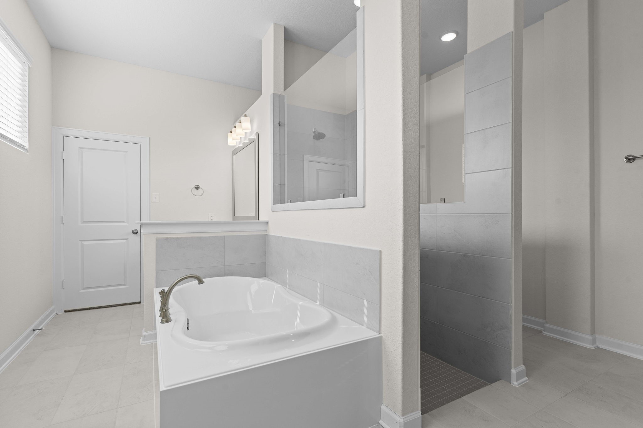 603 Debbie Court Rosharon, TX 77583 - Photo 21 of 26 a bathroom with a sink and a bathtub