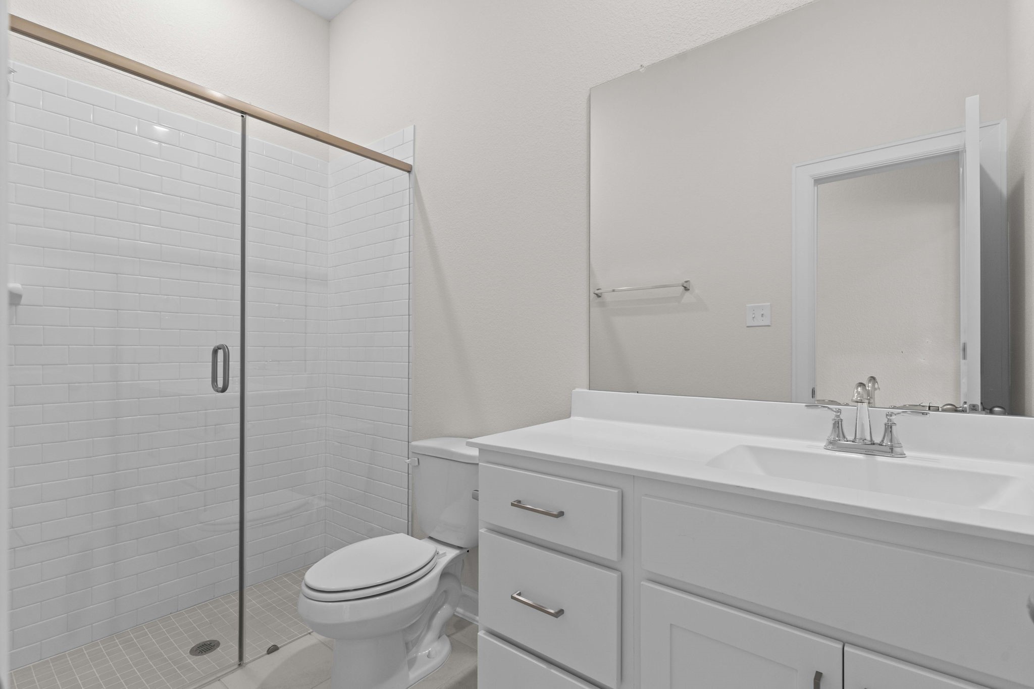 603 Debbie Court Rosharon, TX 77583 - Photo 3 of 26 a bathroom with a sink toilet and vanity