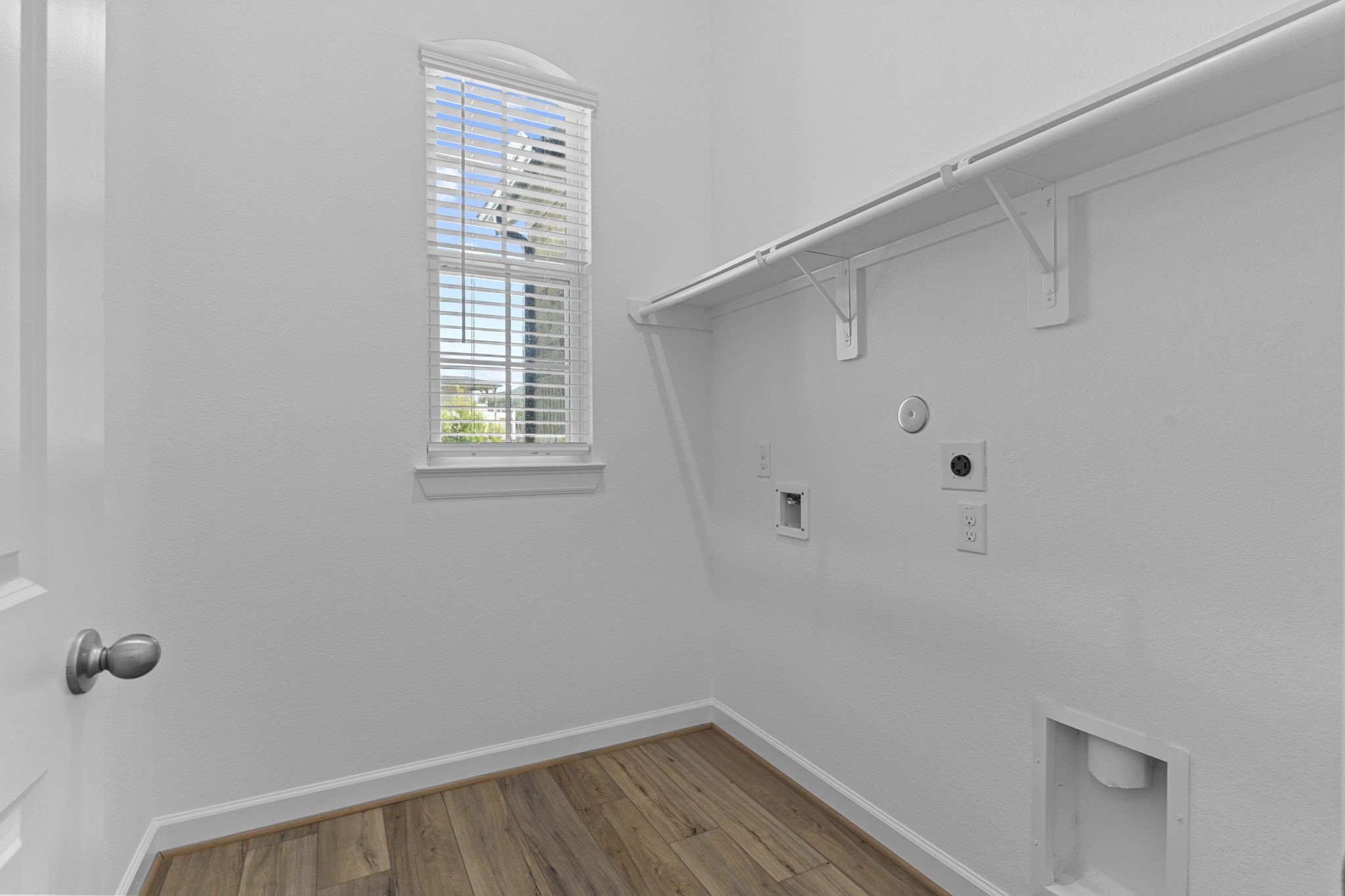 603 Debbie Court Rosharon, TX 77583 - Photo 5 of 26 a view of a small space with racks on the wall