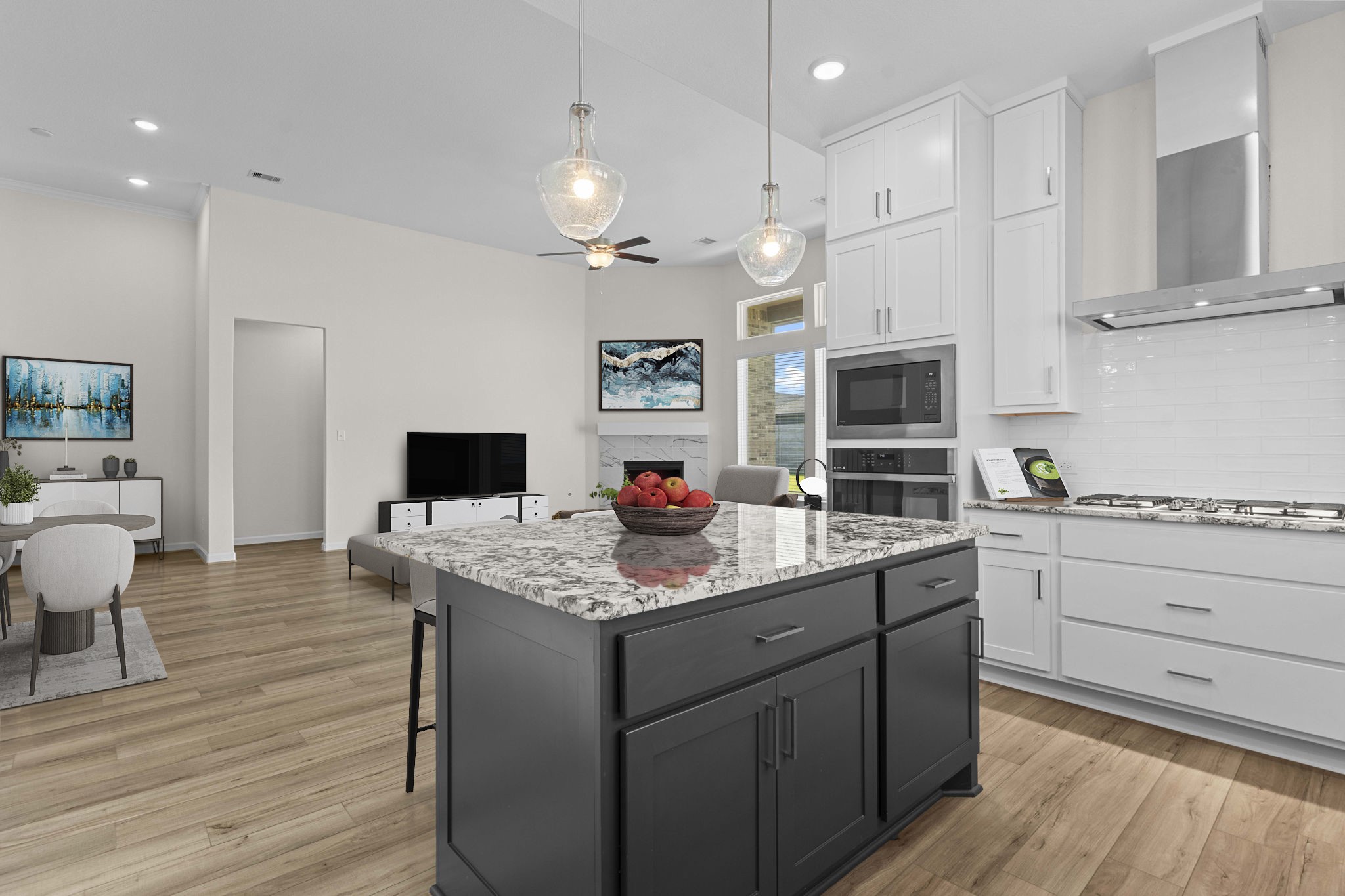 603 Debbie Court Rosharon, TX 77583 - Photo 7 of 26 a kitchen that has a lot of cabinets in it and wooden floor