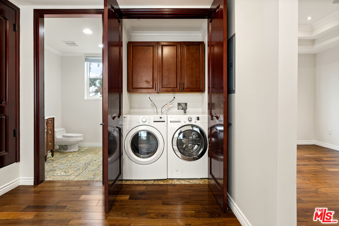 632 North Kings Road, Unit 201 West Hollywood, CA 90048 - Photo 10 of 14 a view of a storage & utility room with wooden floor