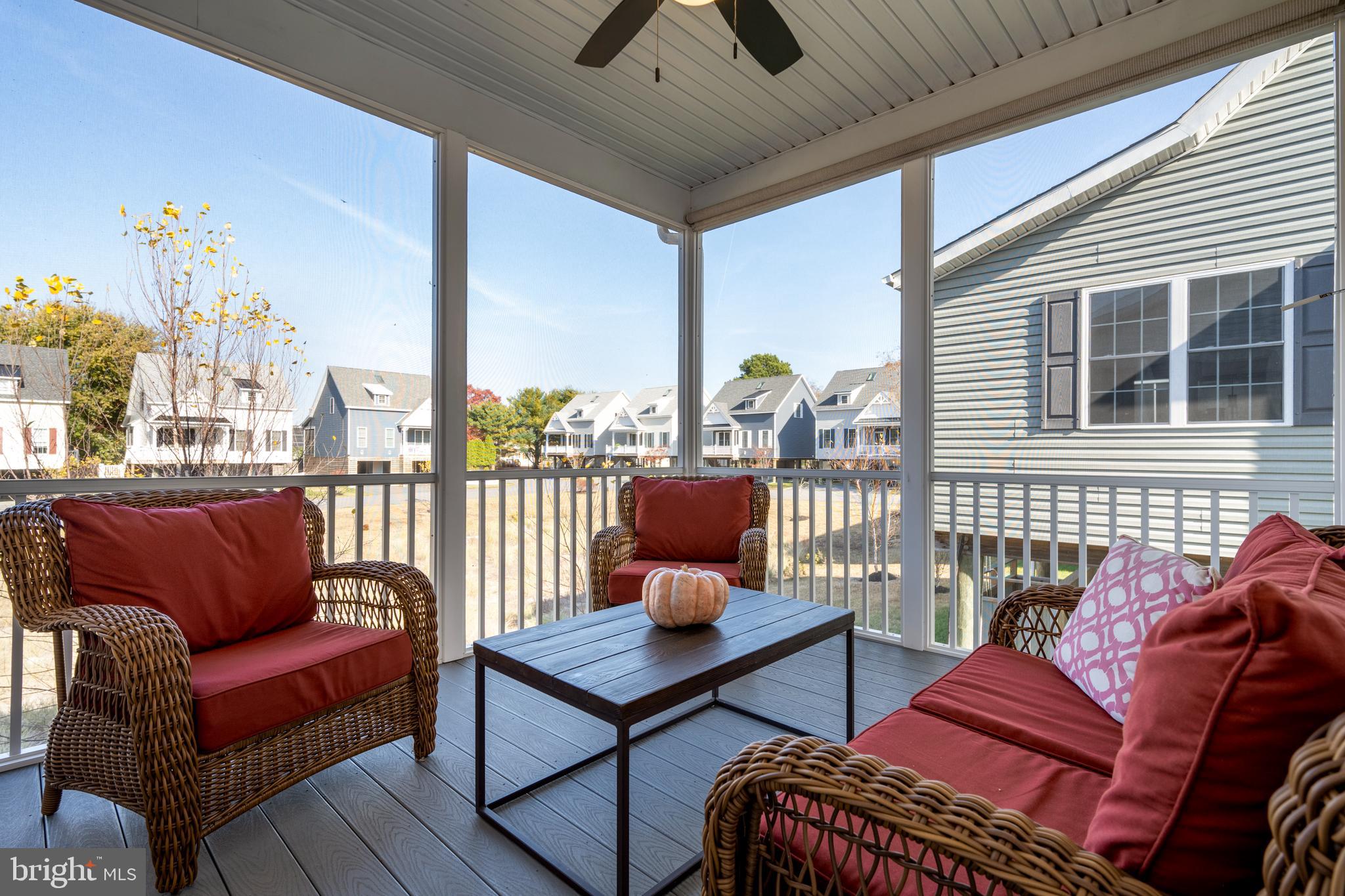 31311 Point Reyes Lane, Unit 15 Ocean View, DE 19970 - Photo 16 of 32 a outdoor living space with patio furniture