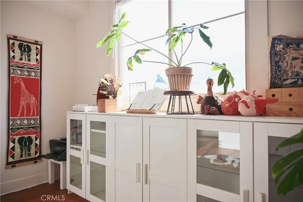 a bathroom with a sink and a window