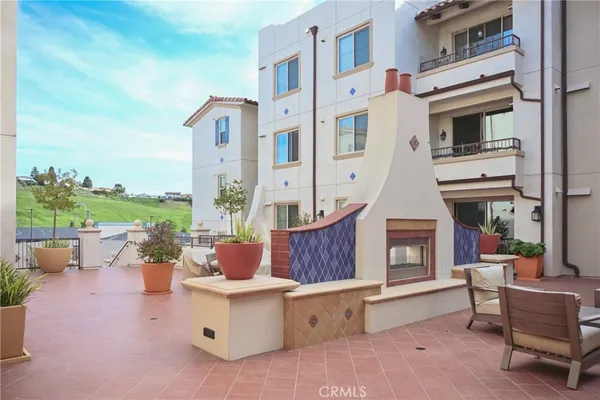 a building outdoor space with patio furniture