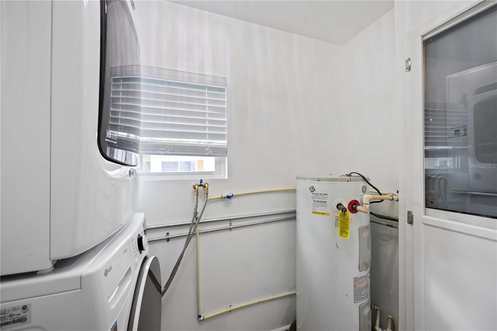 10303 Burnt Store Road, Unit 131 Punta Gorda, FL 33950 - Photo 13 of 25 a view of storage and utility room with a window