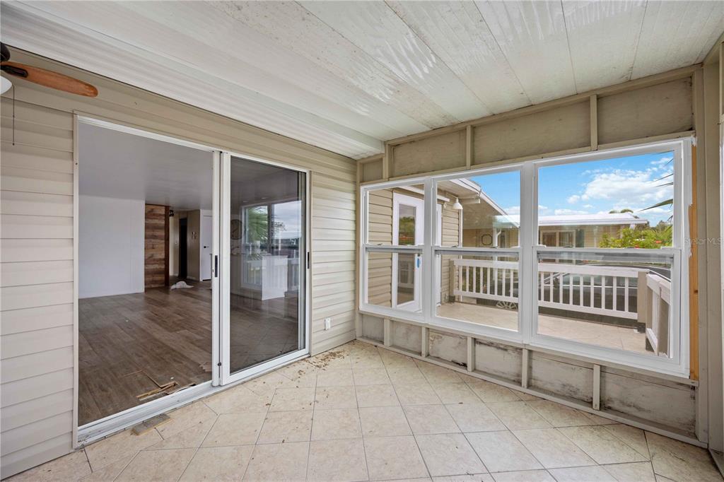 10303 Burnt Store Road, Unit 131 Punta Gorda, FL 33950 - Photo 17 of 25 an empty room with windows