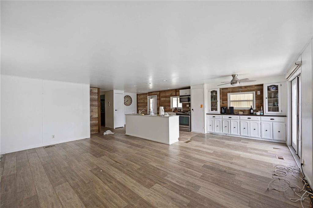 10303 Burnt Store Road, Unit 131 Punta Gorda, FL 33950 - Photo 2 of 25 a view of a living room kitchen and a sink