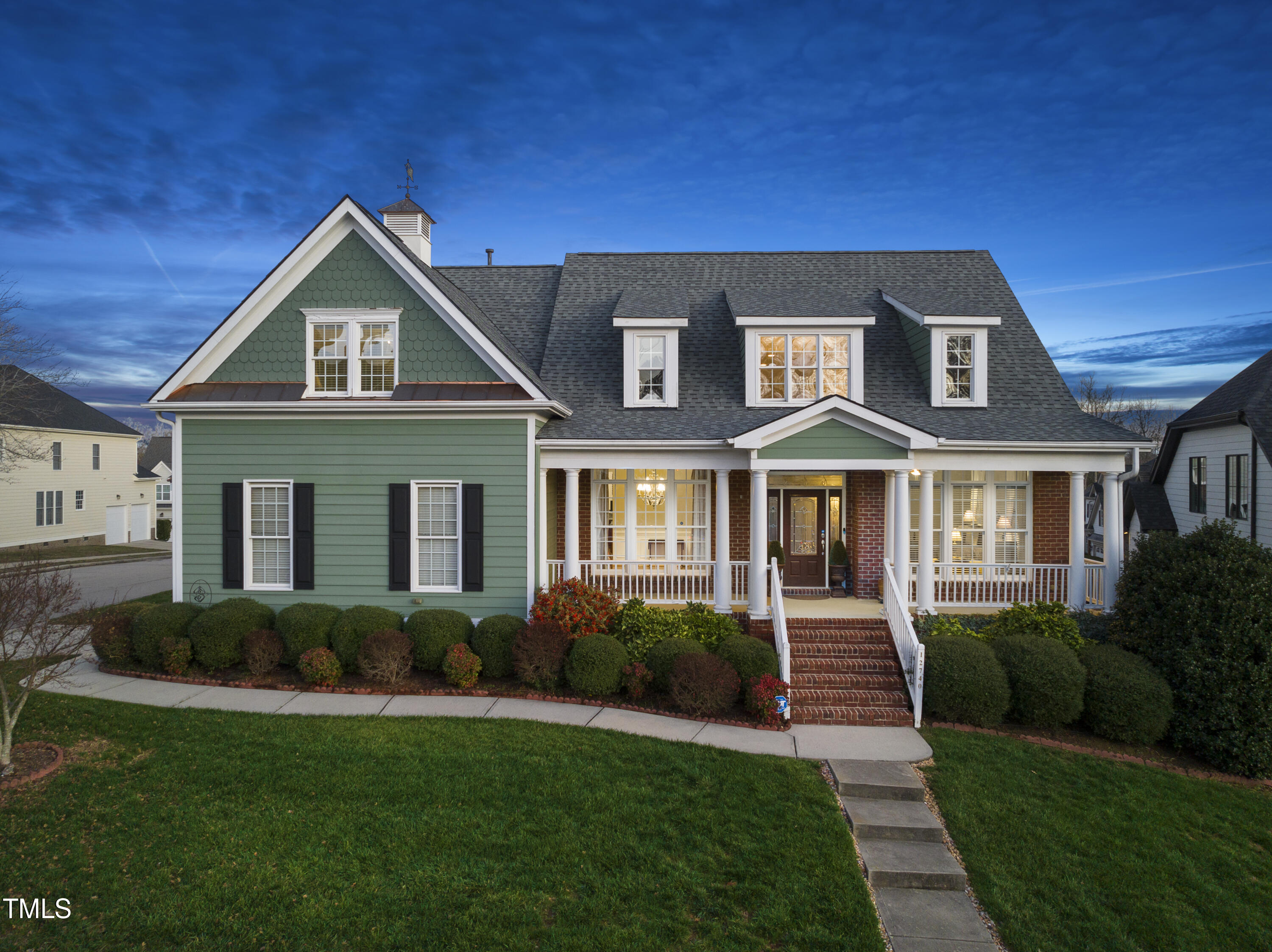 12740 Rosalie Street Raleigh, NC 27614 - Photo 1 of 43 a front view of a house with a yard