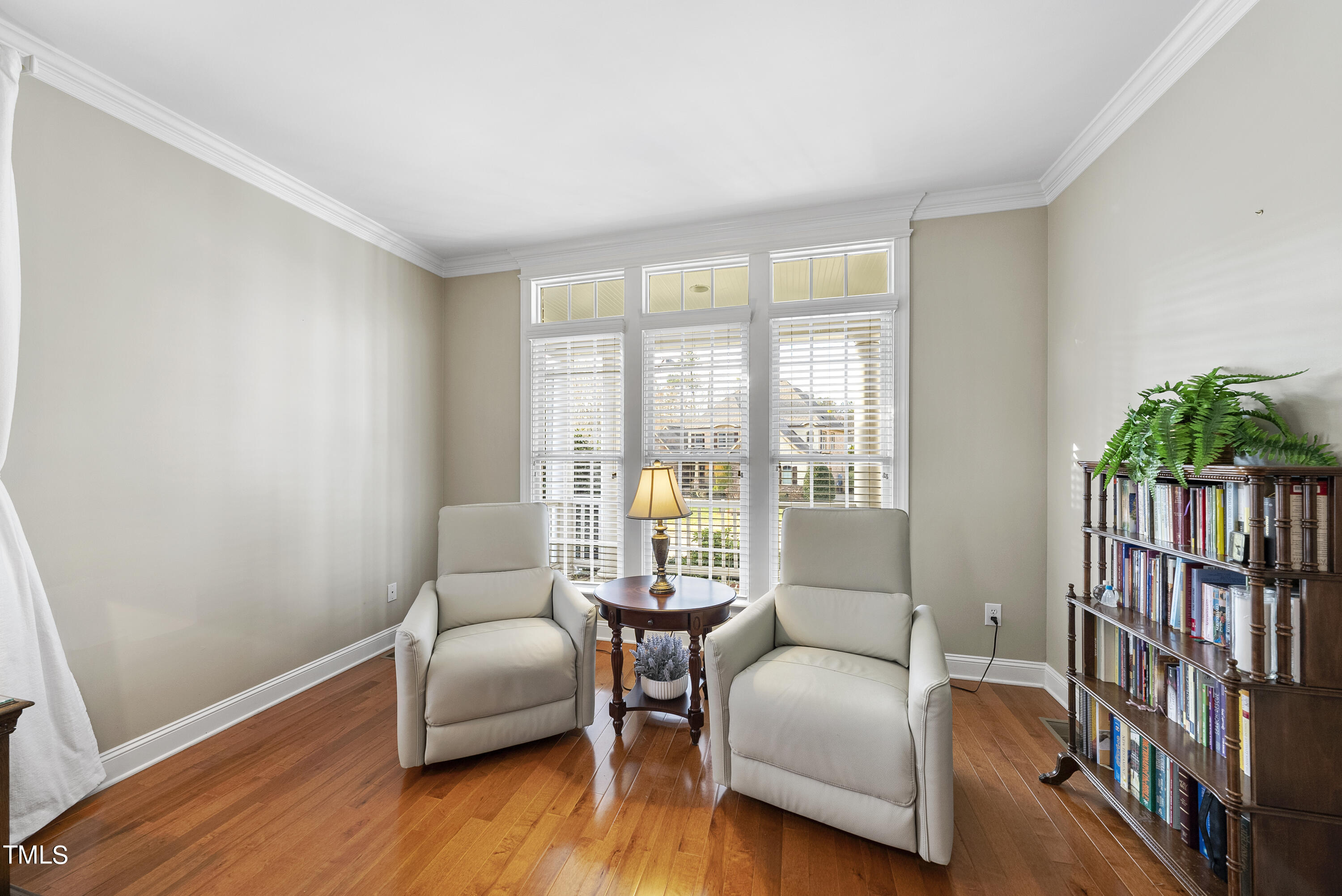 12740 Rosalie Street Raleigh, NC 27614 - Photo 23 of 43 a bedroom with furniture and a potted plant