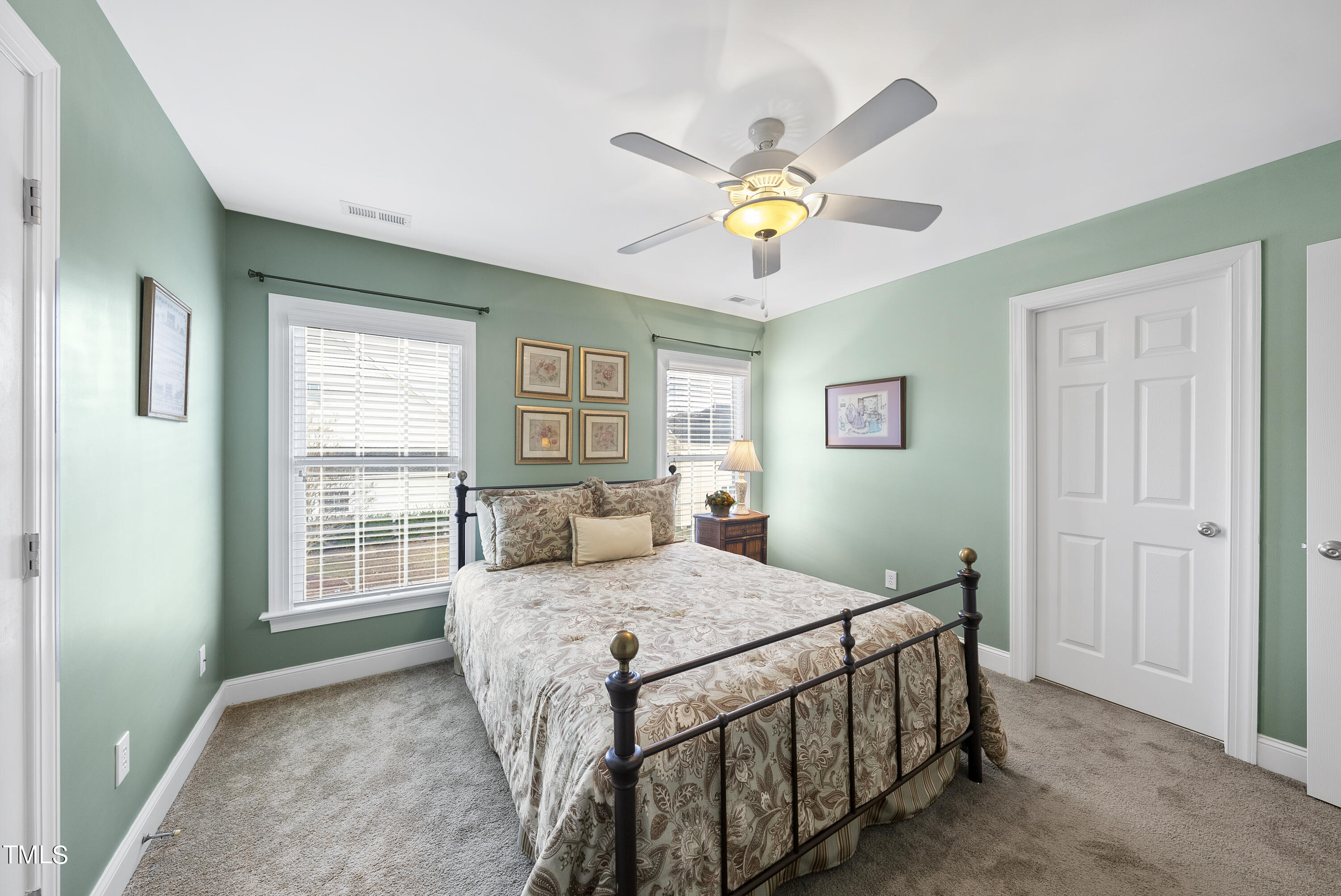 12740 Rosalie Street Raleigh, NC 27614 - Photo 35 of 43 a bedroom with a bed and a window