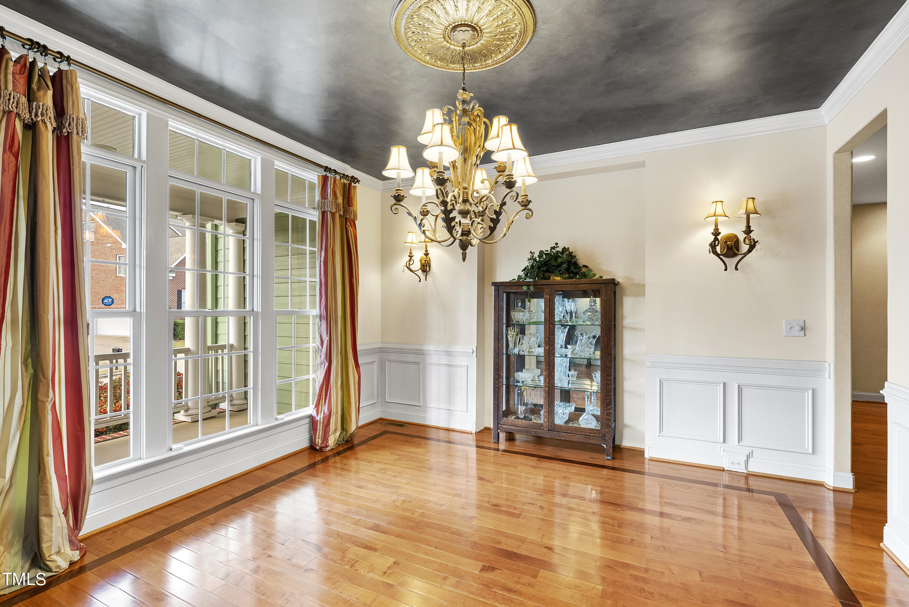 12740 Rosalie Street Raleigh, NC 27614 - Photo 5 of 43 a view of a living room with a large window and chandelier