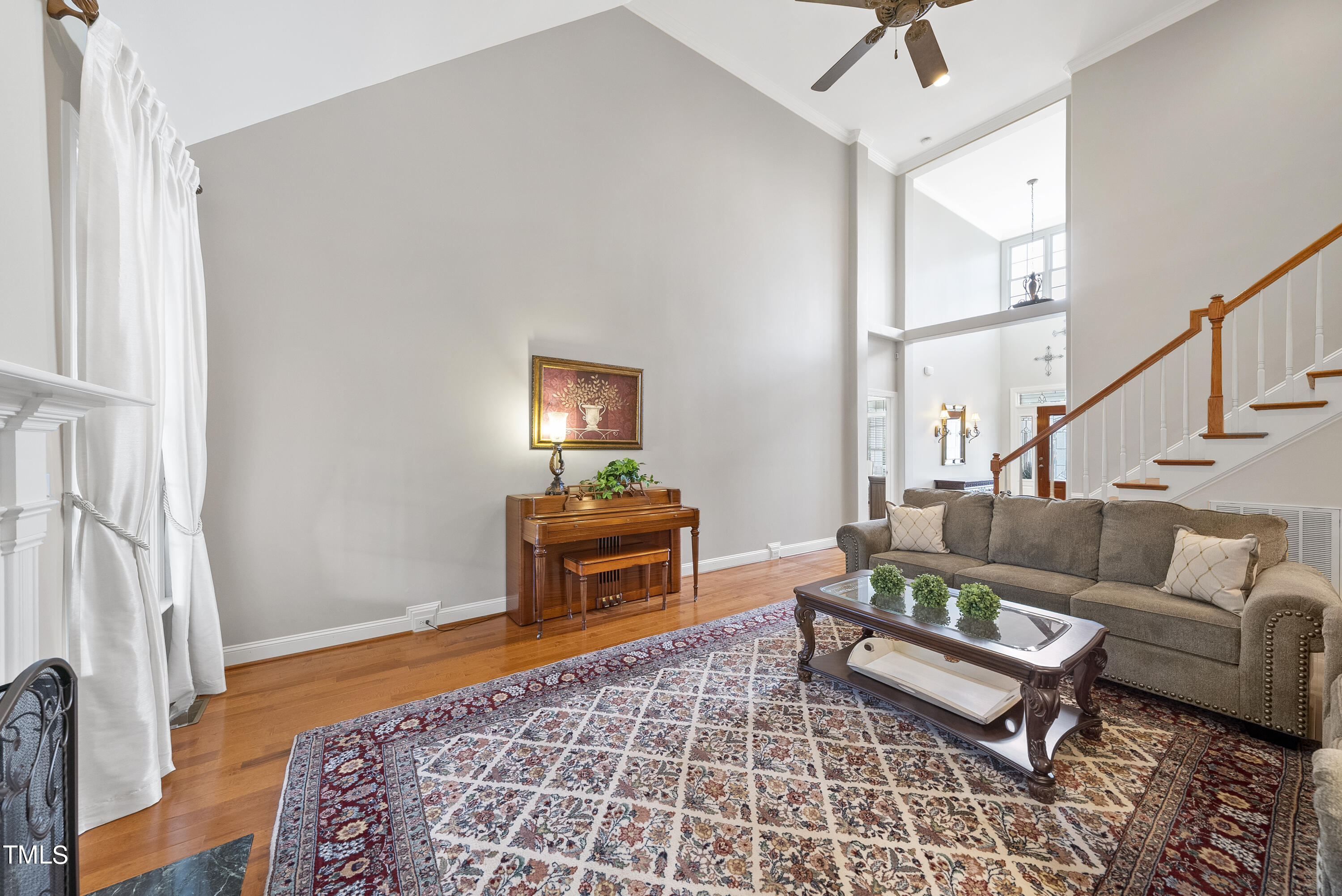 12740 Rosalie Street Raleigh, NC 27614 - Photo 10 of 43 a bedroom with furniture and a rug