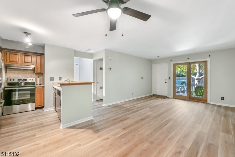 83 Mayfield Road, Unit 83 Bedminster, NJ 07921 - Photo 3 of 9 a view of kitchen with stove and cabinets