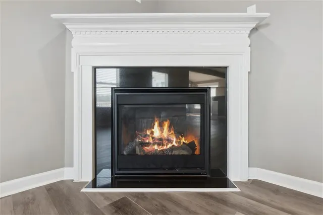 a living room with a fireplace