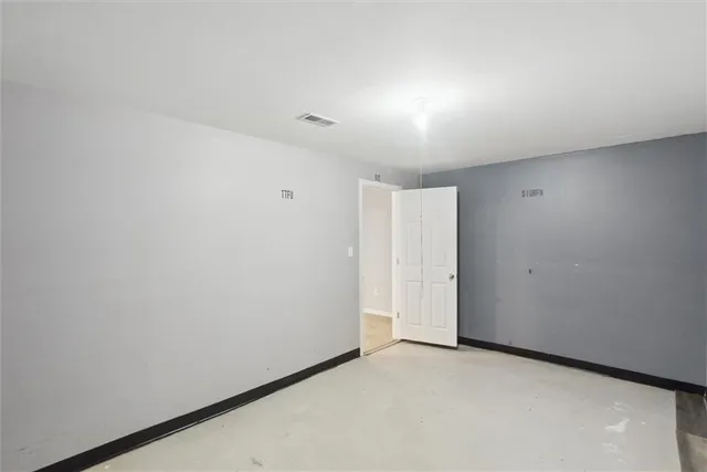 a bathroom with a toilet a sink and shower