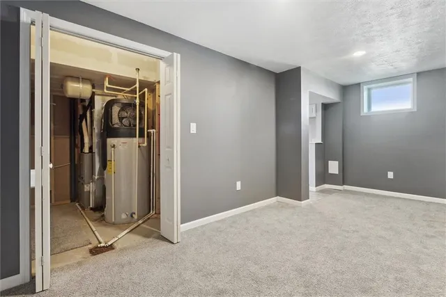 a view of a balcony with wooden floor and fence