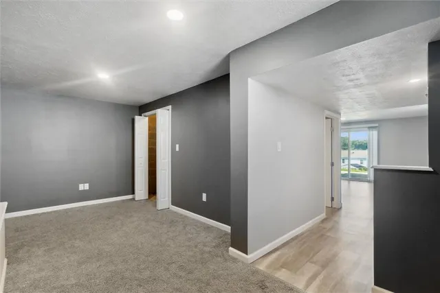 a view of an empty room and window