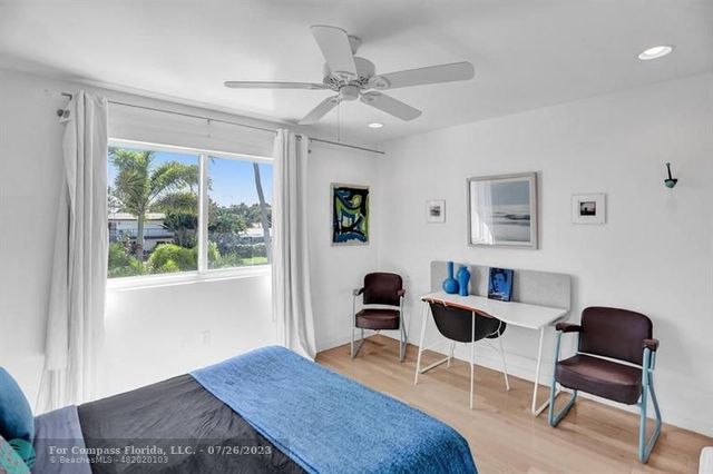 a workspace with furniture and a window