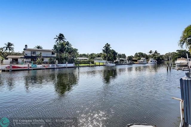 a view of a lake with houses