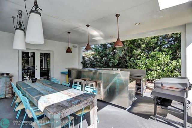 a dinning table and chairs in a room