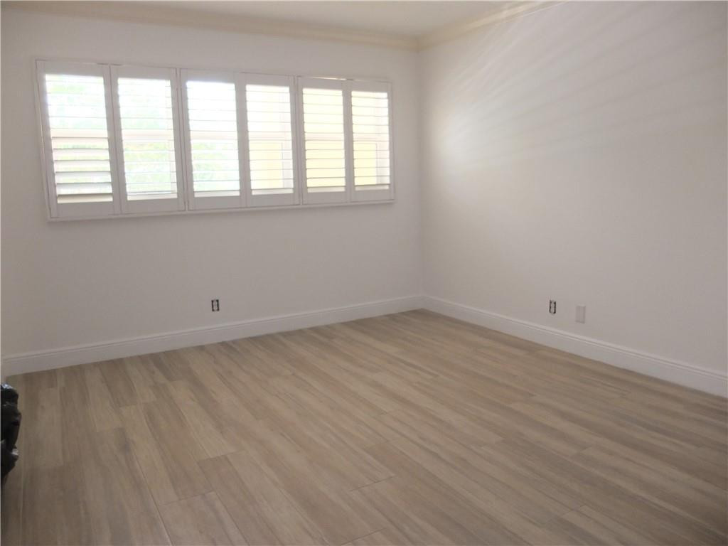 3150 Northeast 48th Court, Unit 204 Lighthouse Point, FL 33064 - Photo 8 of 23 Mstr Bedroom