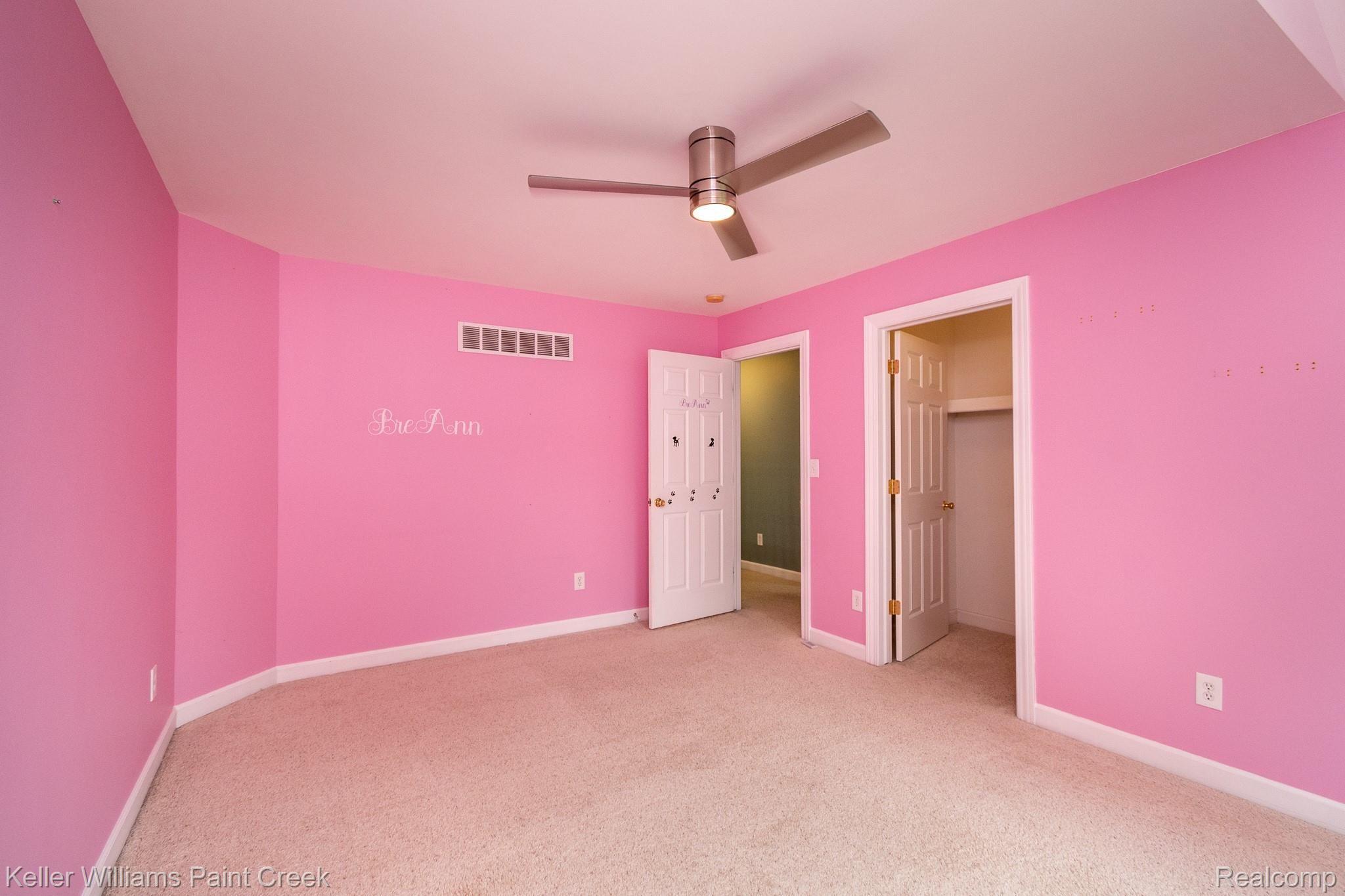 3307 Hazelton Avenue Rochester, MI 48307 - Photo 29 of 41 Upper level bedroom with large closet and ceiling fan