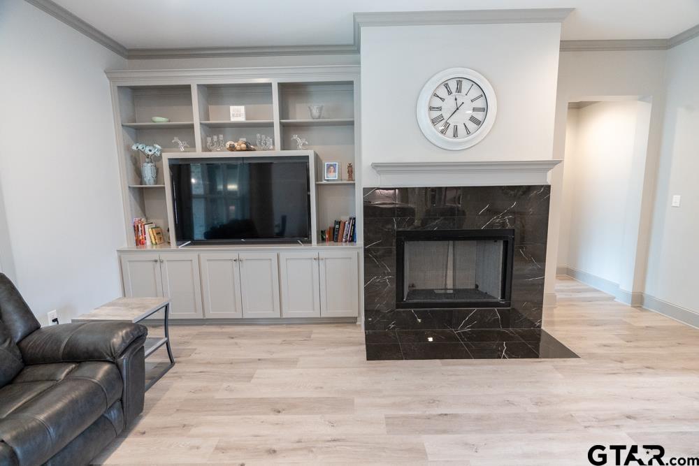 3531 Chapel View Tyler, TX 75707 - Photo 11 of 48 a living room with furniture and a fireplace