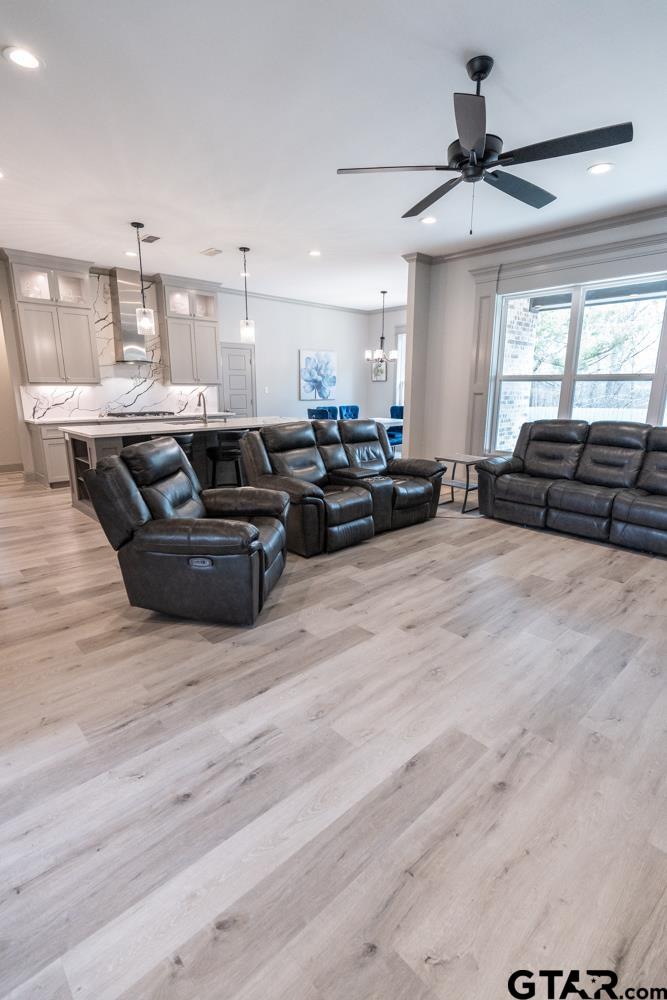 3531 Chapel View Tyler, TX 75707 - Photo 13 of 48 a living room with furniture and a chandelier