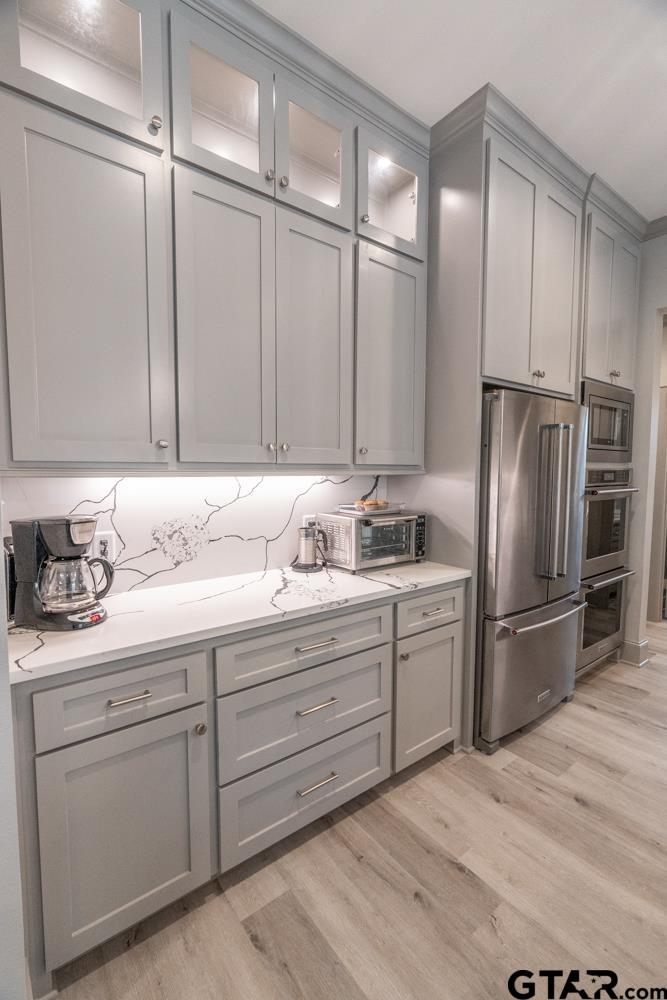3531 Chapel View Tyler, TX 75707 - Photo 19 of 48 a kitchen with appliances cabinets and a sink