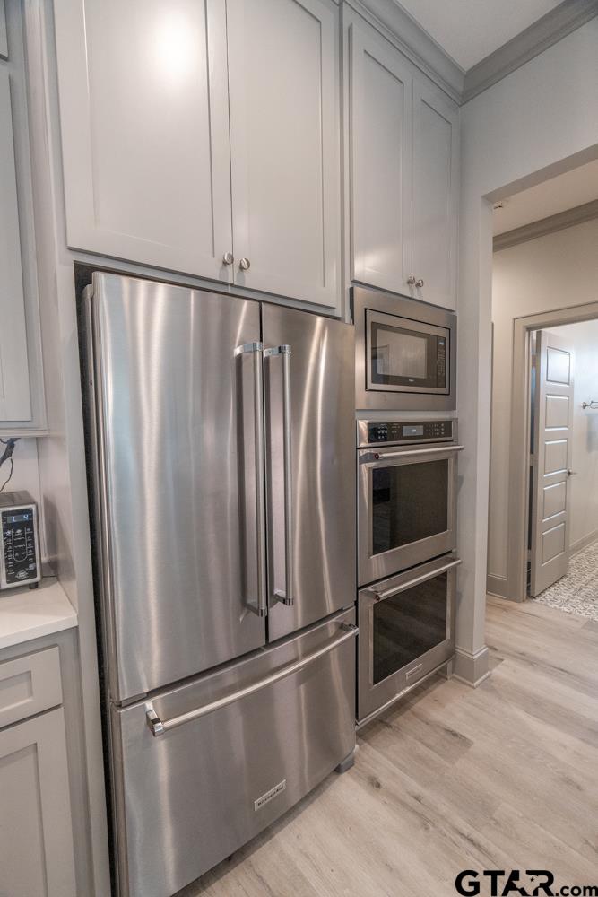 3531 Chapel View Tyler, TX 75707 - Photo 20 of 48 a metallic refrigerator freezer sitting in a kitchen